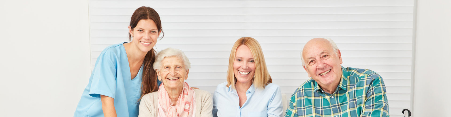 caregivers with their senior patients